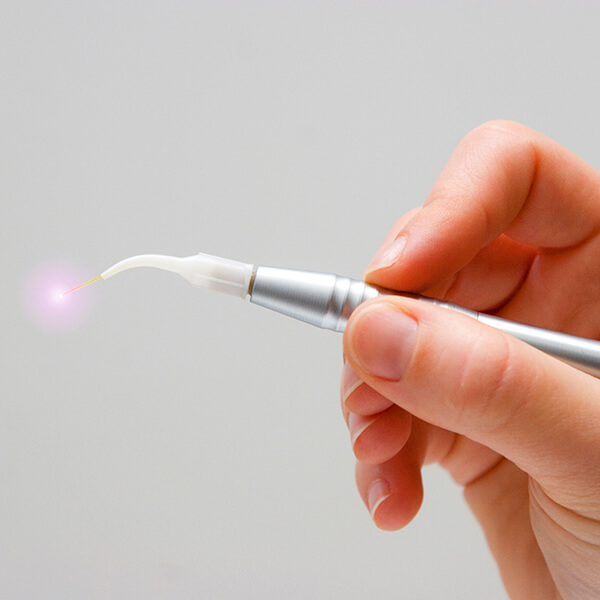 Laser therapy pen attachment shines its laser